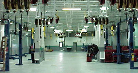 Photo of the inside of a commercial vehicle maintenance facility