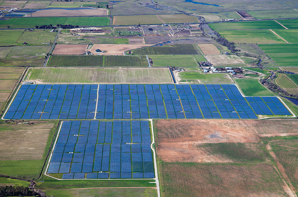 Aerial photo of a large scale solar farm in agricultural land