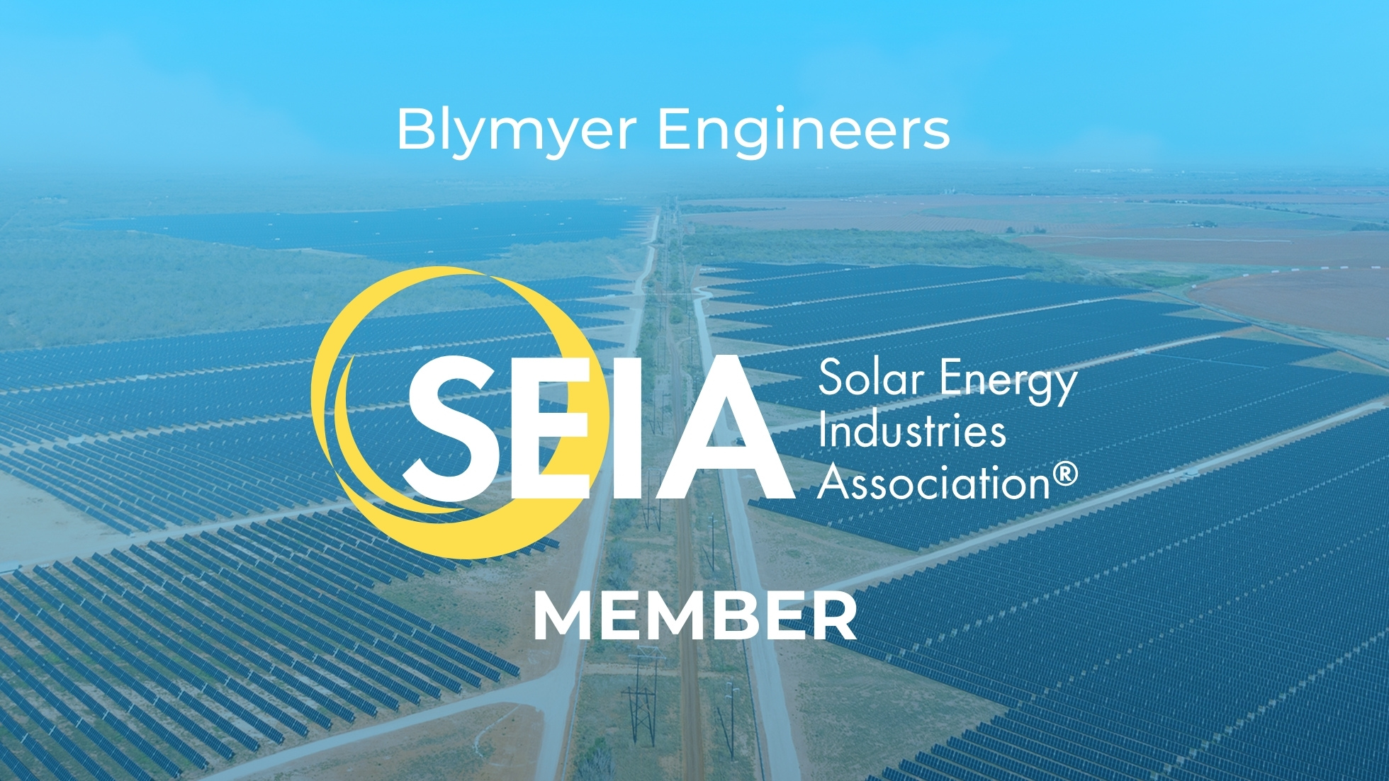 Large field of utility-scale solar panels with SEIA logo and Blymyer Engineers title